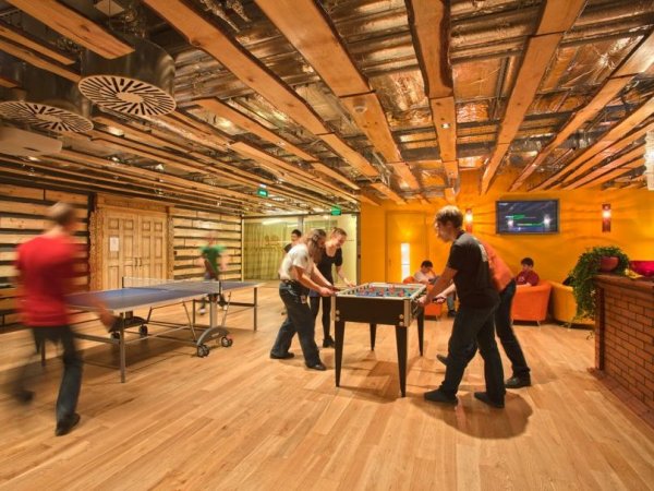 employees-in-moscow-can-play-table-tennis-and-foosball-inside-this-cozy-wood-paneled-room