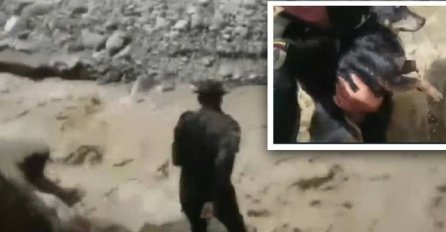 (VIDEO) Nabujala rijeka je nosila psa, a onda je ovaj policajac izveo pravi herojski podvig!