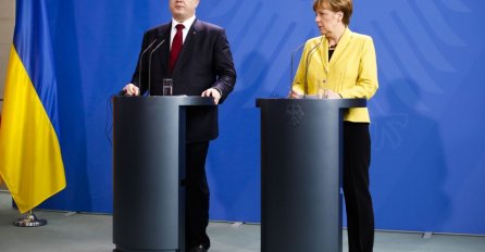 Merkel i Porošenko udruženi: Ne ukidati sankcije Rusiji