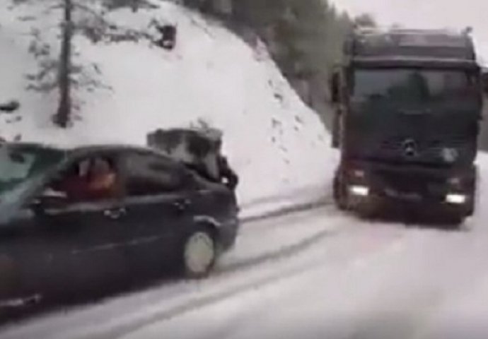 Pogledajte kako BMW i tri momka vuku šleper, i to po snijegu! (VIDEO)