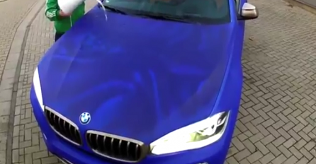 Istresao je kantu vode na BMW X6, a onda se dogodilo nešto što će vas ostaviti u čudu (VIDEO)