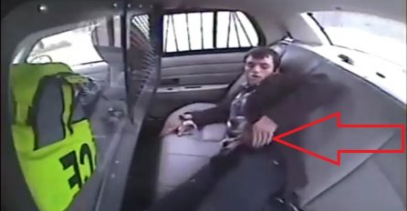 Kriminalac htio upaljačem da zapali policijsko auto, pogledajte šta će se dogoditi na 0:13 (VIDEO)