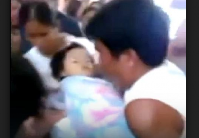 Otac posljednjim zagrljajem spasio trogodišnju ćerku (VIDEO)