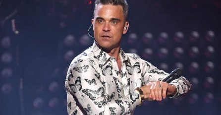 Iznenadio fanove: Robbie Williams potpuno go na naslovnici gay magazina (FOTO)