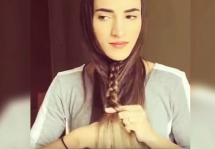 Počela je da plete pletenicu ispod svoje brade a dobila iznenađujuće dobru frizuru (VIDEO)