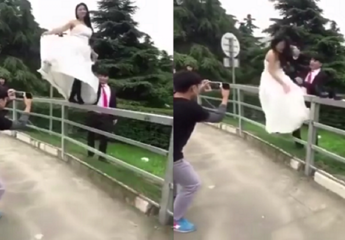 Htjela je da ima posebne slike sa vjenčanja pa se popela na ogradu, ovaj dan će pamtiti dok je živa (VIDEO)