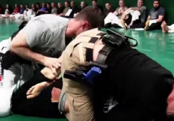 Pogledajte šta se desi kad dva policajca pokušaju staviti lisice MMA borcu (VIDEO)