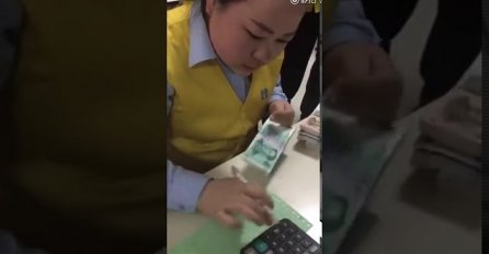 Mašina za brojanje novca je zaista brza, ali morate pogledati ovu ženu jer ona broji novac brže od mašine (VIDEO)
