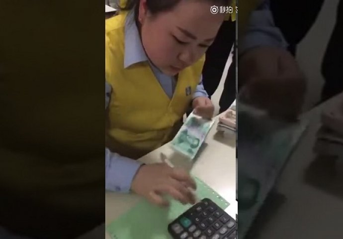 Mašina za brojanje novca je zaista brza, ali morate pogledati ovu ženu jer ona broji novac brže od mašine (VIDEO)