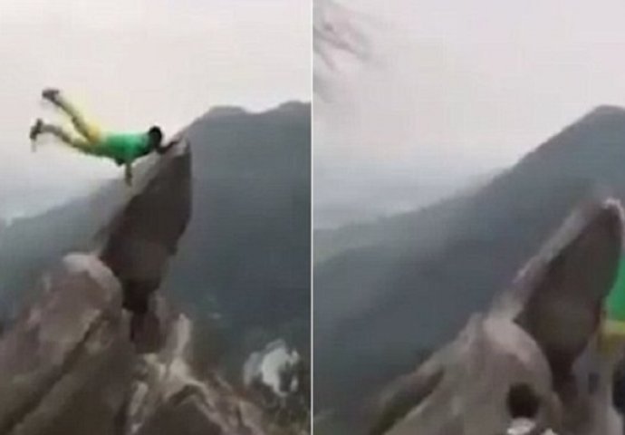 Turist se popeo na stijenu u želji da dođe do što bolje fotografije, čekajte da vidite šta se događa na 0:13 (VIDEO)