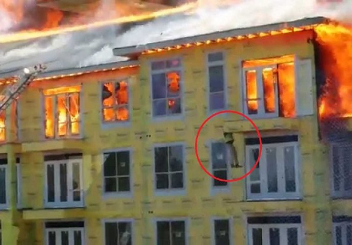 Pogledajte dramatični bijeg građevinca iz zapaljene zgrade! (VIDEO) 