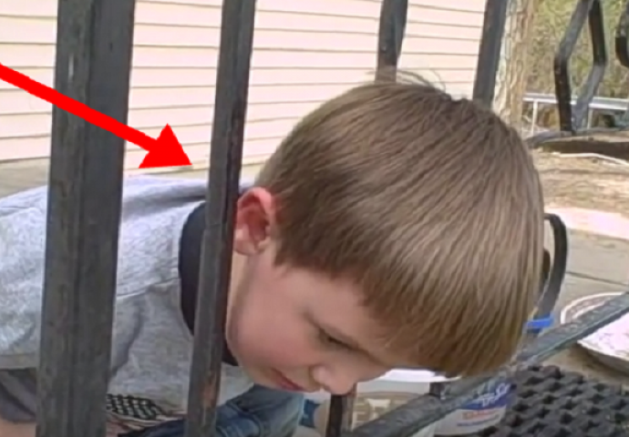Zapela mu je glava u ogradi i tata ga nije uspio izvući, a onda je klinac sve šokirao! (VIDEO)