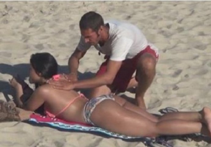 Htio je da kremom namaže djevojku u bikiniju koja je ležala na plaži, ali kada se okrenula uslijedio je šok (VIDEO)