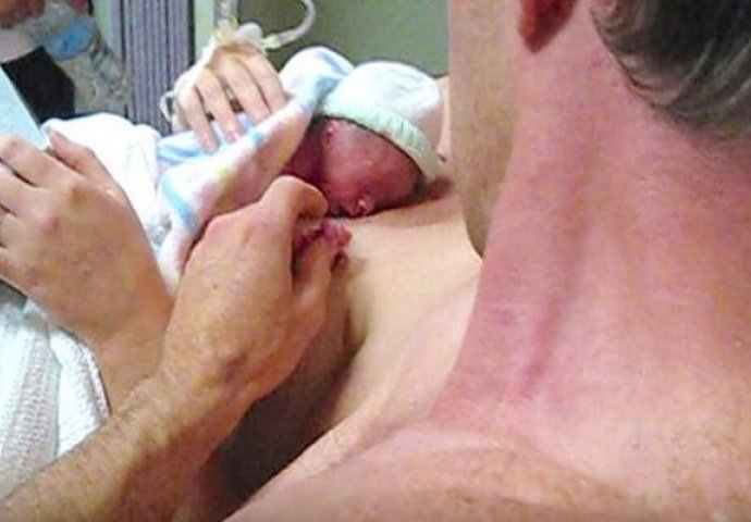 Jedno od blizanaca je umrlo pri rođenju, onda je tata pogledao na majčine grudi i vidio nešto nezamislivo (VIDEO)