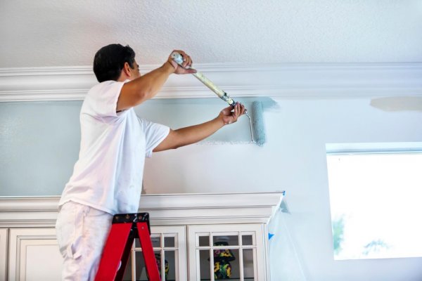 istock-000029226014-man-painting-wall-with-roller-jpg-rend-hgtvcom-1280-853