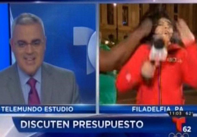 Lijepa voditeljica javljala se uživo u vijestima kada joj je prišla debela crnkinja, ono što će uslijediti šokiralo je sve pored TV ekrana! (VIDEO)