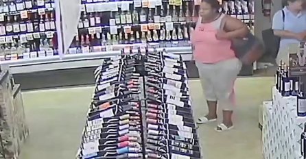 Pogledajte kako je ova crnkinja u samoposluzi ukrala 18 boca alkohola! (VIDEO)