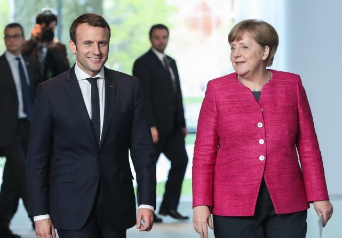 Reuters: Moguć epski 'sudar' Macrona i Merkel s Trumpom u Davosu