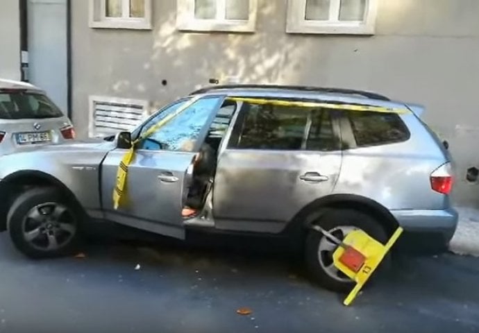 Nakon povratka iz prodavnice, vidio je da su na njegov BMW postavili 'kandžu'. Njegova reakcija? BRUTALNO! (VIDEO) 