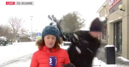 REPORTERKU TOKOM PRENOSA UŽIVO POGODIO GRUDVOM U GLAVU: Ovakvu njenu reakciju nije očekivao (VIDEO)