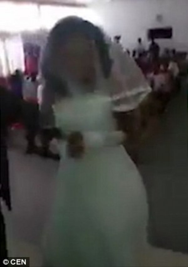 spurned-girlfriend-gatecrashes-her-boyfriends-wedding-to-his-new-love-wearing-bridal-gown