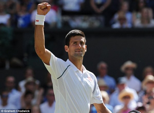 2a6a690900000578-3156329-novak-djokovic-clenches-his-fist-in-celebration-after-securing-h-m-21-1436557016475