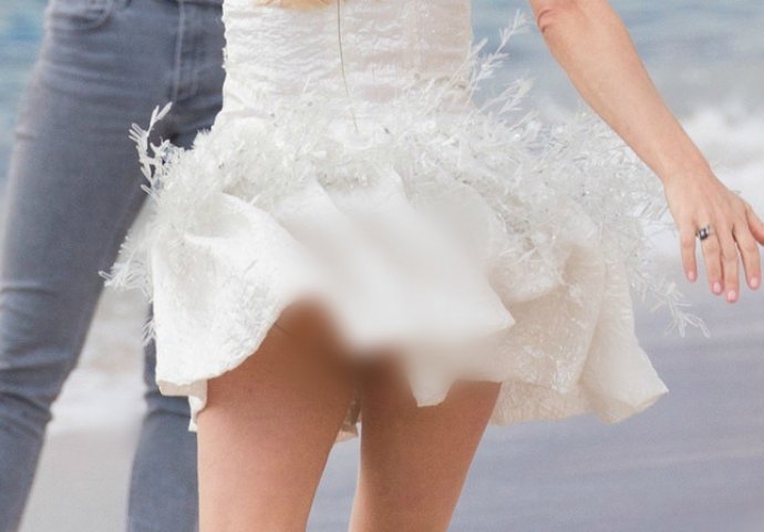 SLIKALA SE NA PLAŽI, A ONDA JE PUHNUO VJETAR, POSMATRAČI SE ZGROZILI: 'Kakva ti je to zadnjica?'