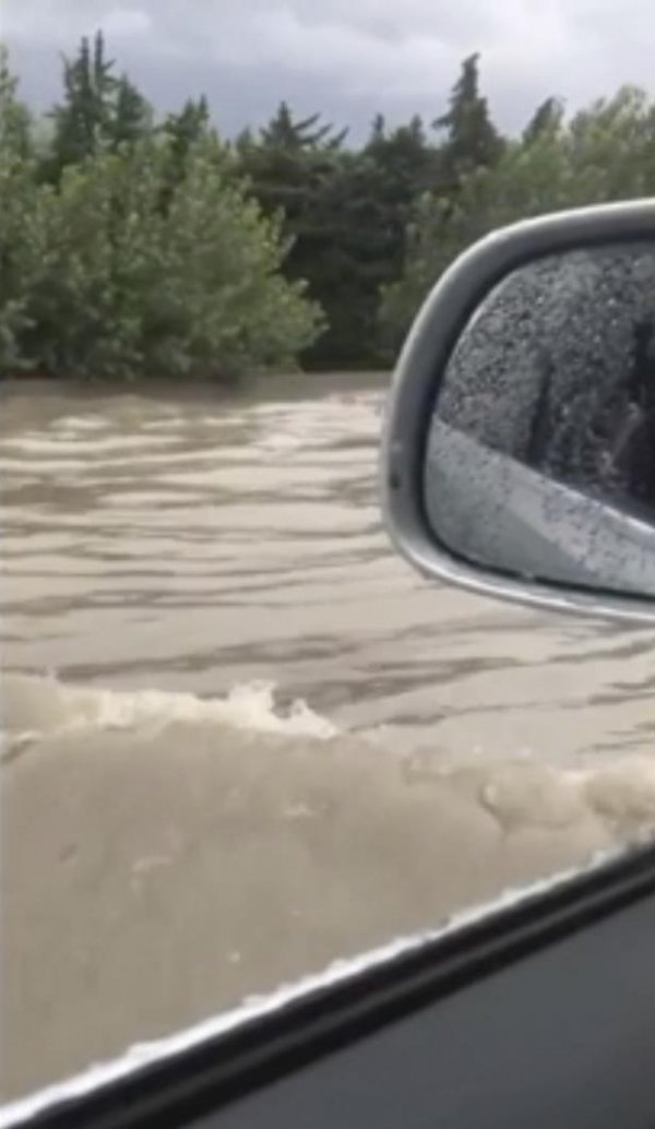 in-this-image-from-video-flash-floods-send-a-torrent-of-water-down-a-street-in-aubagne-france-on-thu-123868