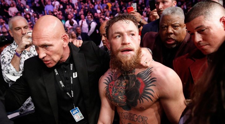 conor-mcgregor-leaves-cage-after-ufc-229-1040x572