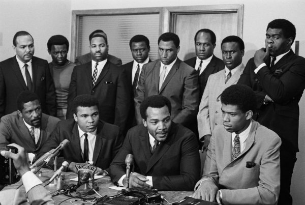 african-american-athletes-at-news-conference-af400c2cb31b07a9