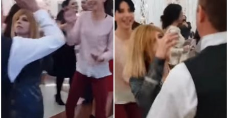 POKUŠAO JE DA NA SVADBI PORED ŽIVE SUPRUGE PLEŠE SA DRUGOM: Pratite samo šta radi ova crnka! (VIDEO)