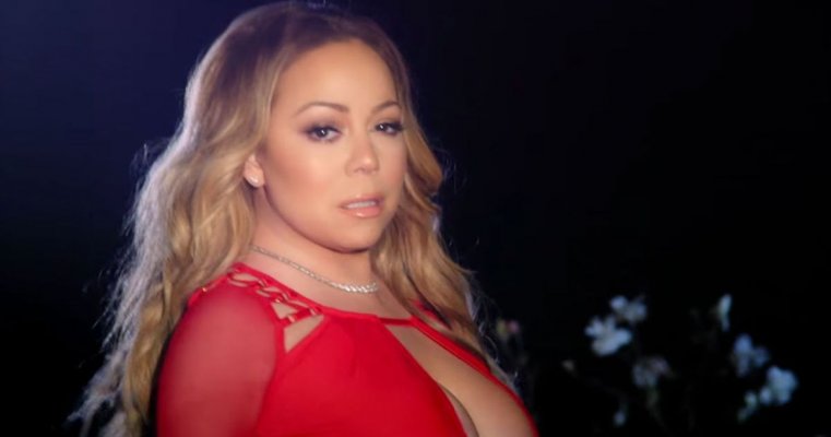 mariah-carey-sets-her-wedding-dress-ablaze-in-a-new-music-video