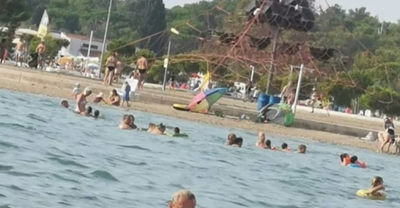 HIT NA FACEBOOKU, HRVATI PLAČU OD SMIJEHA: Muškarac začudio ostale ljude na plaži, pogledajte ŠTA JE RADIO DOK SE KUPAO