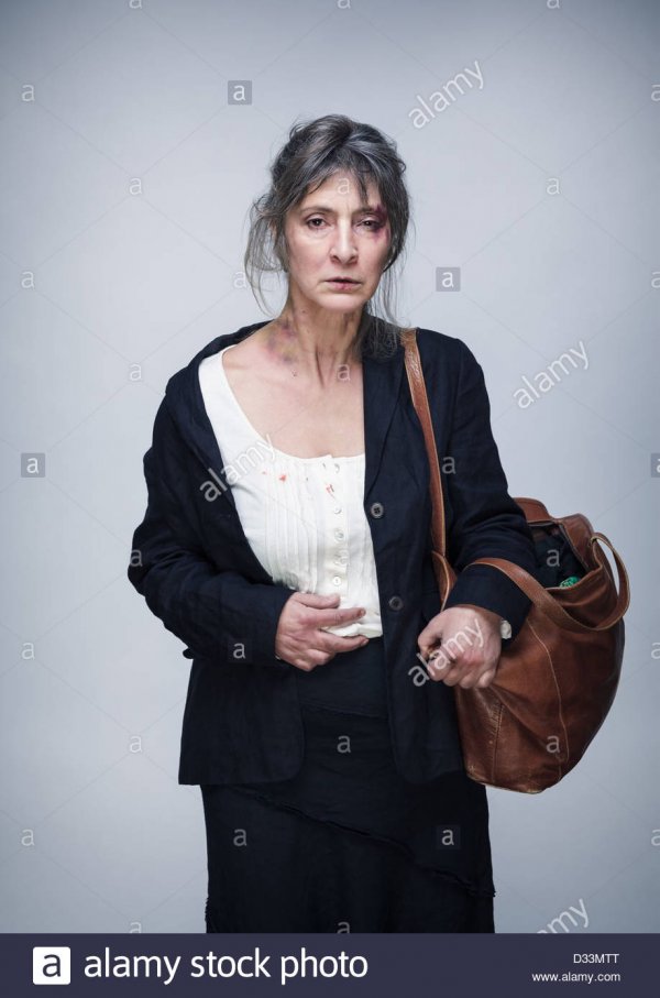 tired-and-defiant-middle-aged-professional-woman-after-a-fight-with-d33mtt
