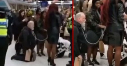 SVI SU GLEDALI U NJIH, ŽENA NA LANCU ŠETALA MUŠKARCA: Ali kad su pročitali natpis koji je nosio LJUDI SU SE ZGROZILI (VIDEO)