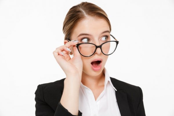 close-up-picture-shocked-blonde-business-woman-eyeglasses-looking-away-white-171337-6299