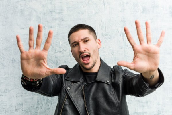 young-rocker-man-showing-number-ten-with-hands-1187-49185