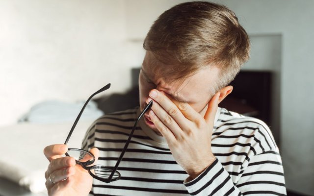 tired-exhausted-man-taking-off-glasses-feeling-eye-strain-after-work-man-suffering-from-dry-eye-sy-1080x675