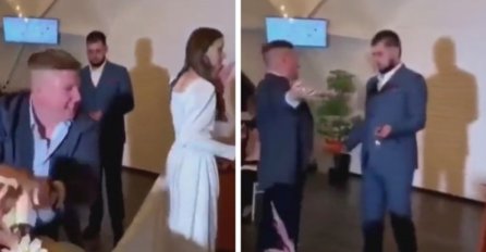 HAOS NA VJENČANJU! PIJANI GOST BACIO TORTU NA MLADENCE: A rekacija mladenaca je postala viralna, niko se ovome nije nadao (VIDEO)