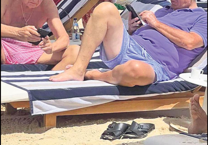 POZNATI POLITIČARI UHVAĆENI KAKO SE IZLEŽAVAJU NA PLAŽI! Sunčali se u NAJSKUPLJEM rizortu, nisu ispuštali telefone! (FOTO)