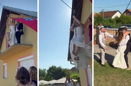 Hit video iz Hrvatske: Mladenka se s balkona do mladoženje spustila na sajli (VIDEO)